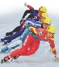 photograph of a group of four speed skaters on ice