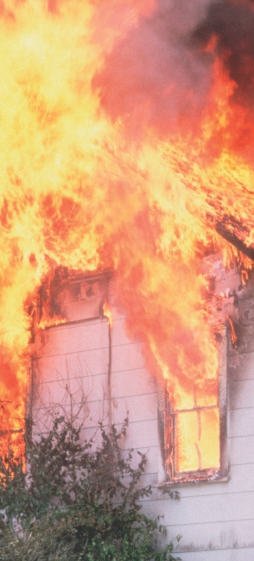 photograph of a house on fire