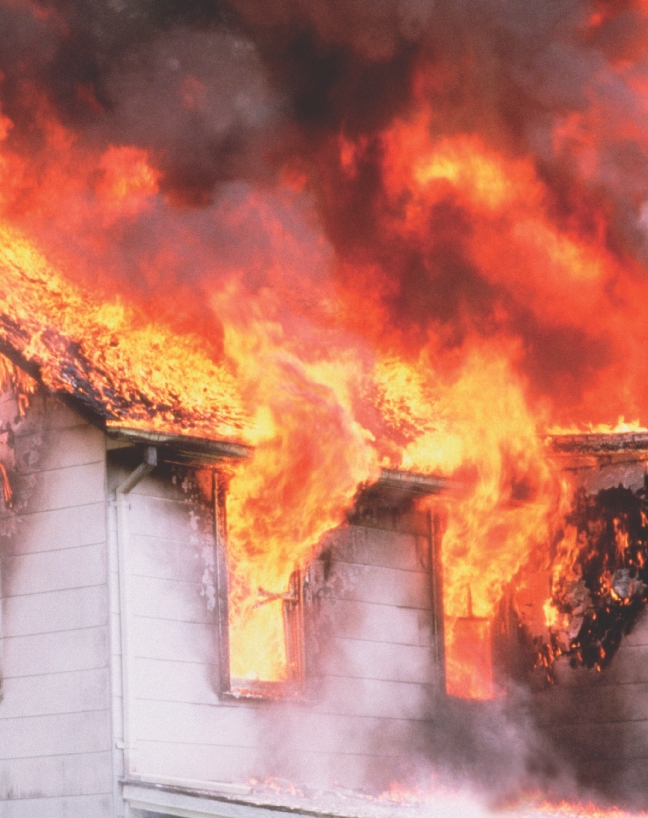 photograph of a house on fire