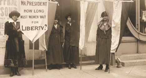 Women carried signs to protest for their rights.