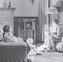 photograph of a family from the 1940s listening to the radio