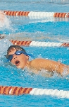 photograph of a swimmer in a swimming pool