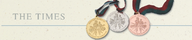 A photograph of three prize medals