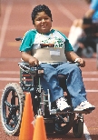 photograph of a Special Olympics athlete in a wheelchair