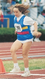 photograph of a female Special Olympics athlete on a running track