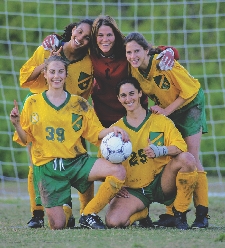 Sports writer Jane Gottesman noticed that photos often showed male athletes playing sports and female athletes standing still.