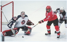 U.S. hockey player Sarah Tueting (left) helped her team win a gold medal at the Olympics.