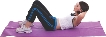 photograph of a woman starting a sit-up on an exercise mat