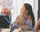 photograph of a young woman placing an order in a restaurant