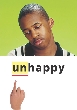 photograph of a teenage boy who is not smiling and the word unhappy