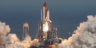 photograph of the space shuttle lifting off