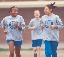 photograph of three people running