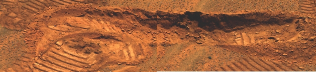 photograph of the red, dusty surface of Mars