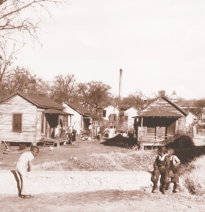 photograph of homes in a black neighborhood