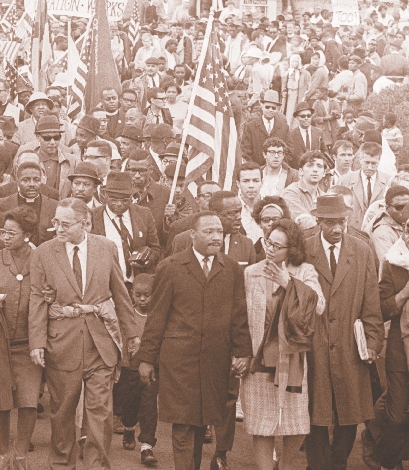 photograph of Martin and his wife leading a march of people