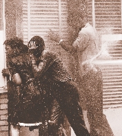 Birmingham, Alabama, 1963. Police spray protesters with a fire hose.