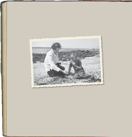 photograph of Rachel Carson and a young boy on a beach