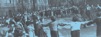 photograph of children playing in a playground from before the war