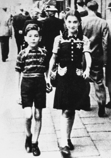 photograph of two Jewish children wearing the star patches on their clothing