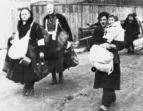 photograph of a group of homeless Jewish people on a street