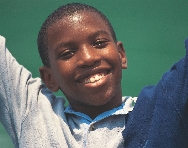 photograph of a boy's face smiling