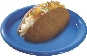 photograph of a baked potato on a plate