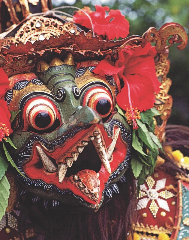 Photograph of the title page of the selection “Making Masks.” An elaborate, colorful mask is shown.