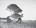 A pilot tries to take off in his glider.