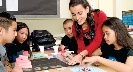 Photograph of students working together at a table