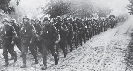 Photograph (black and white) of Nazi soldiers on the move