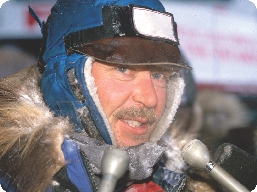 Photograph: an inset of the musher being interviewed