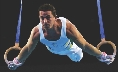 Photograph of a gymnast using apparatus (rings)