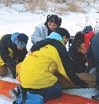 Members of the Dragon Slayers practice an emergency call.