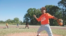 Photograph of players at a Little League baseball game