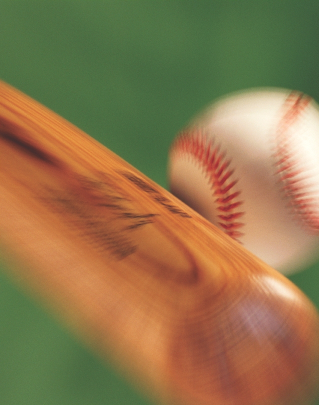 Photograph of a bat making contact with a baseball (background photo)