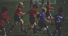 Photograph of children palying a game of soccer