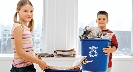 Photgraph of children with recycle bins