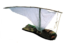 Sailboat made of a broken rubber sandal and a piece of a plastic bag (Kenya)