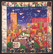 Photograph of a quilt of a city scene