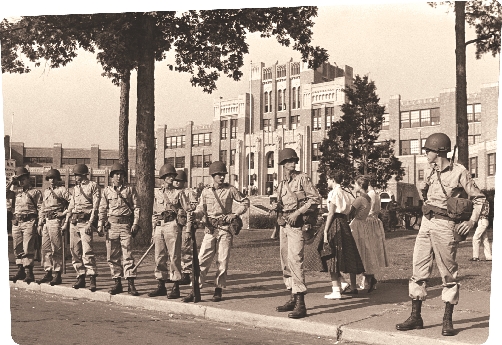 National Guard troops stand outside Central High School in 1957.