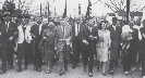 Photograph of King and others walking in a civil rights march