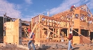 Photograph of frame of a house under construction