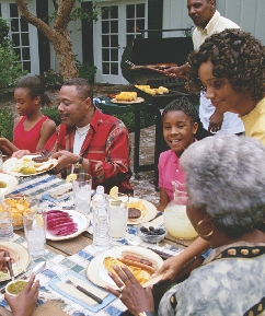 A family shares a meal on Earth.