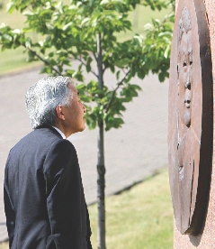 Japanese Emperor Akihito visits a monument dedicated to Chiune Sugihara in Vilnius, Lithuania. Several monuments around the world honor Sugihara.