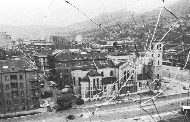 This is a view of downtown Sarajevo through a shattered window, in 1994.