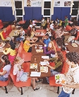 Photograph of students eating in a school cafeteria