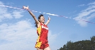 Photograph of a runner crossing the finish line