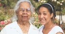 Photograph of a teenage girl and an older woman (her grandmother)