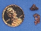 Photograph of a penny with pieces of copper to the side