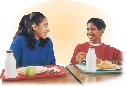 Photograph of the same boy and girl having lunch together